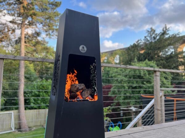 beautiful luxury chiminea with trees and viaduct in background